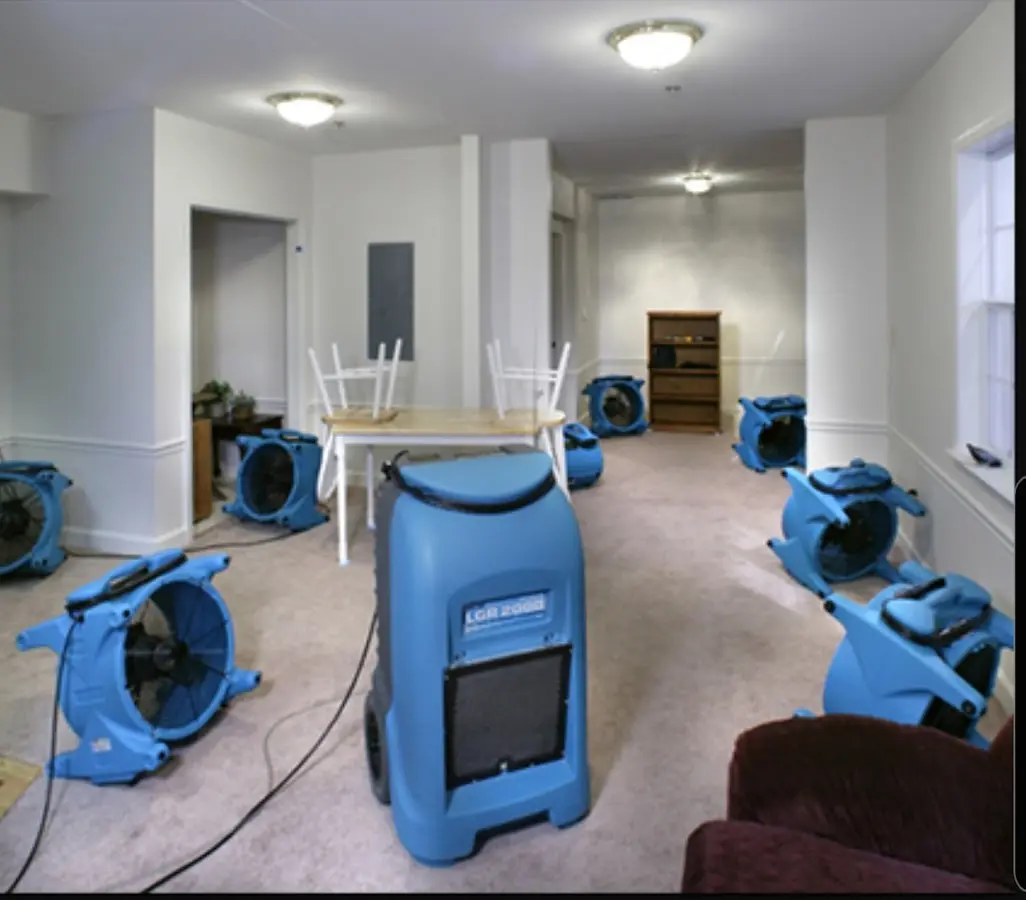 Air movers and dehumidifier setup for Water Damage Restoration in Enumclaw